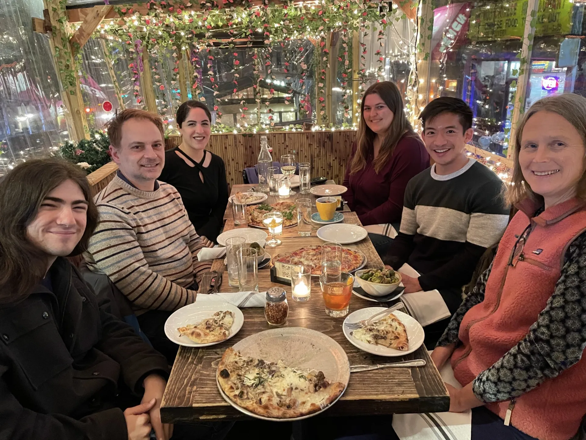 Lab members having a pizza party